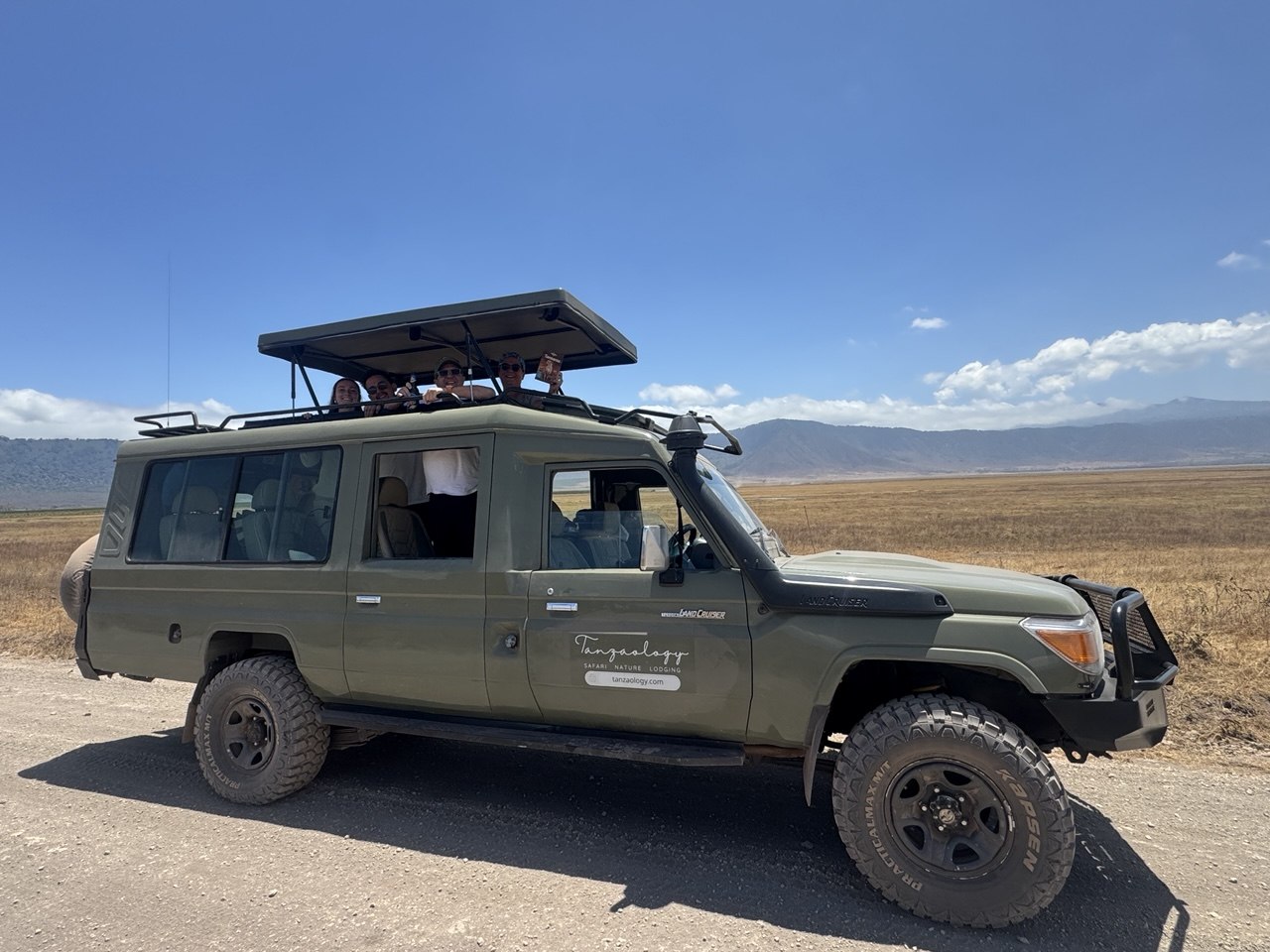 A Tanzaology vehicle on the Ngorongoro crater rim road